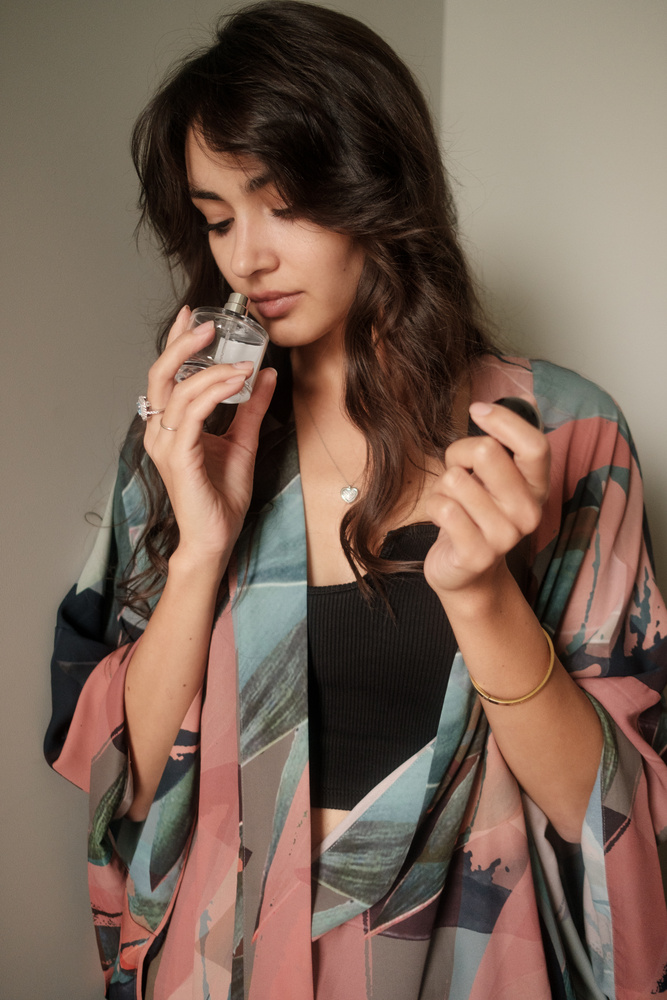 Woman Smelling Perfume 